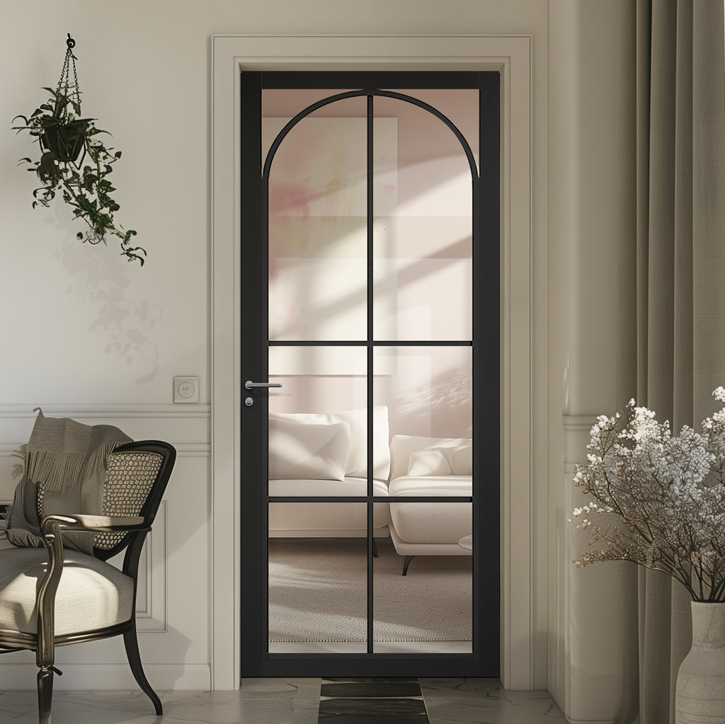 A black internal door with clear glass panes, prefinished, installed in an interior setting with a visible architrave.
