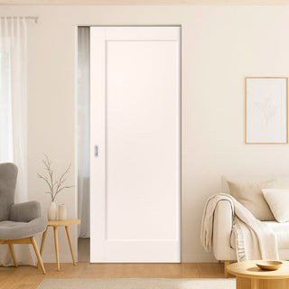 Image: Modern interior design of a living room with a white door, gray armchair, and beige sofa.
