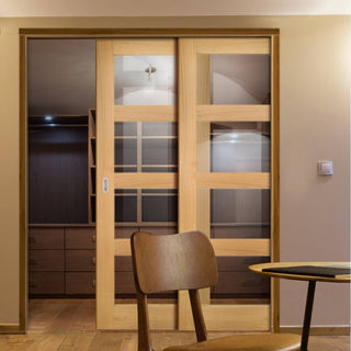 Image: Coventry Shaker Style Oak Veneer Staffetta Twin Telescopic Pocket Doors - Clear Glass - Unfinished