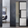 Tribeca 3 Pane Black Prefinished Absolute Evokit Single Pocket Door - Clear Reeded Glass