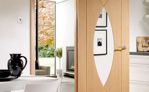 A Modern Style Pesaro Oak Door with Clear Safety Glass