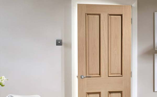 Traditional Victorian oak fire door with raised mouldings