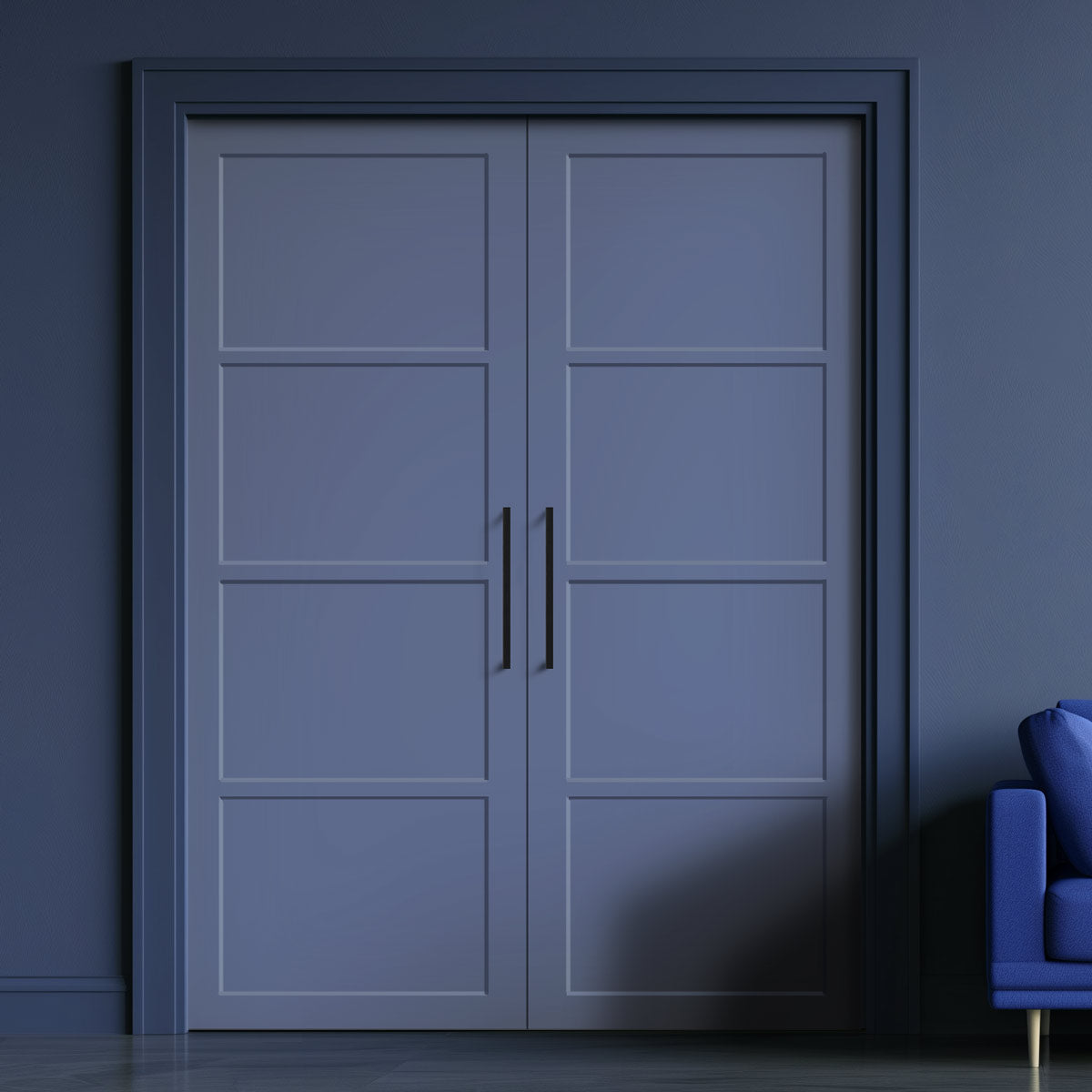 A pair of primed blue internal wooden doors with a panel design, situated in a darker blue or grey room, with a modern handle on each door and a visible sample chair to the side.