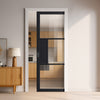 Cosmo Black Industrial Single Evokit Pocket Door with Clear Glass - Laminated - Prefinished