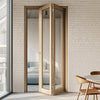 OUTLET - Contemporary Pattern 10 Oak Bifold Internal Door - Clear Glass 1981x762x35mm