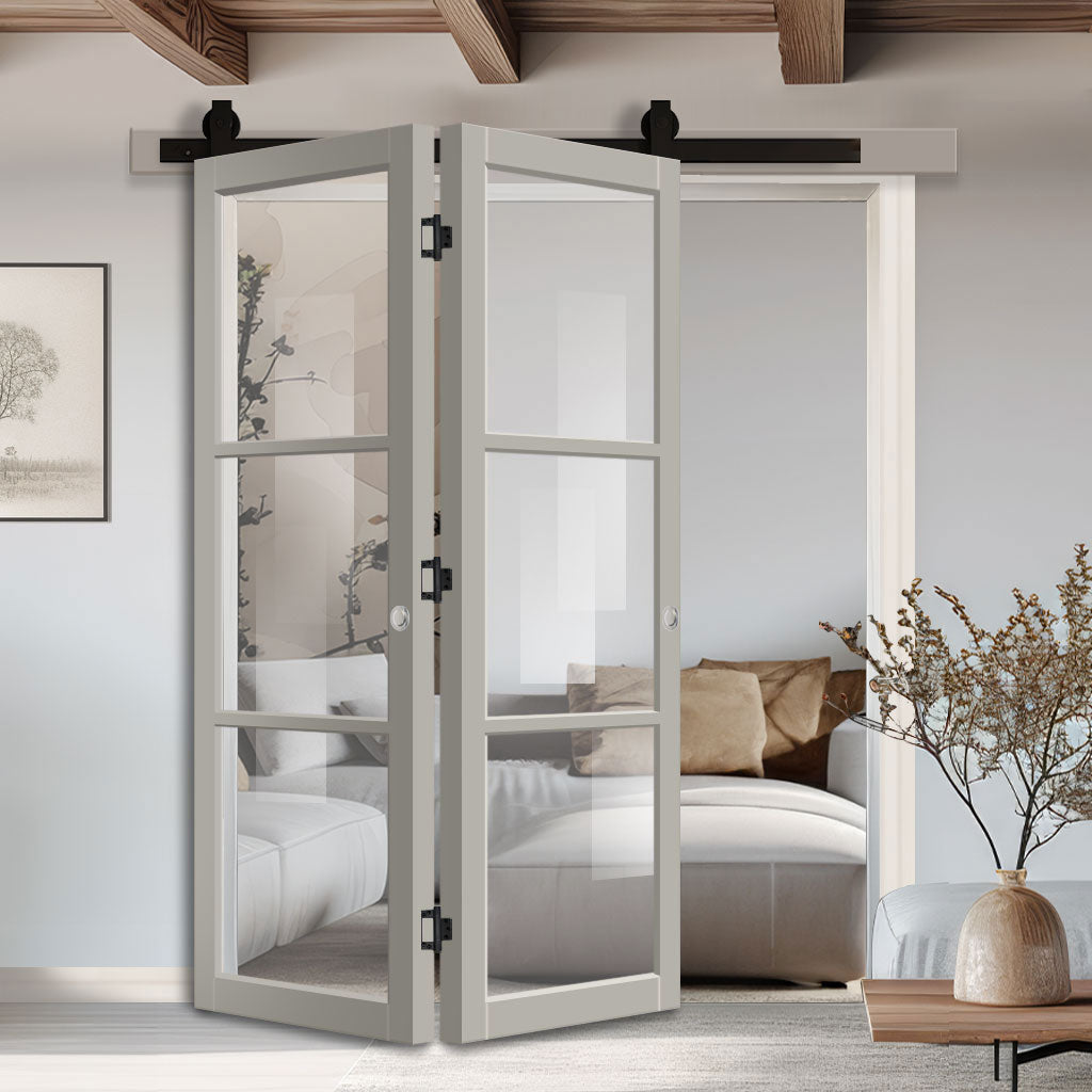 SpaceEasi Top Mounted Black Folding Track & Double Door - Eco-Urban® Manchester 3 Pane Solid Wood Door DD6306G - Clear Glass - Premium Primed Colour Options