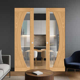 Image: Ravello Oak Double Absolute Evokit Pocket Doors - Prefinished - Clear Glass