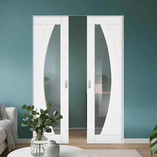 Image: Ravello White Double Absolute Evokit Pocket Doors - Prefinished - Clear Glass