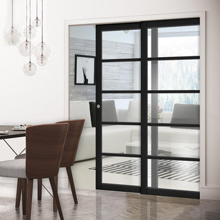 Image: Shoreditch Black Staffetta Twin Telescopic Pocket Door - Prefinished - Clear Glass - Urban Collection