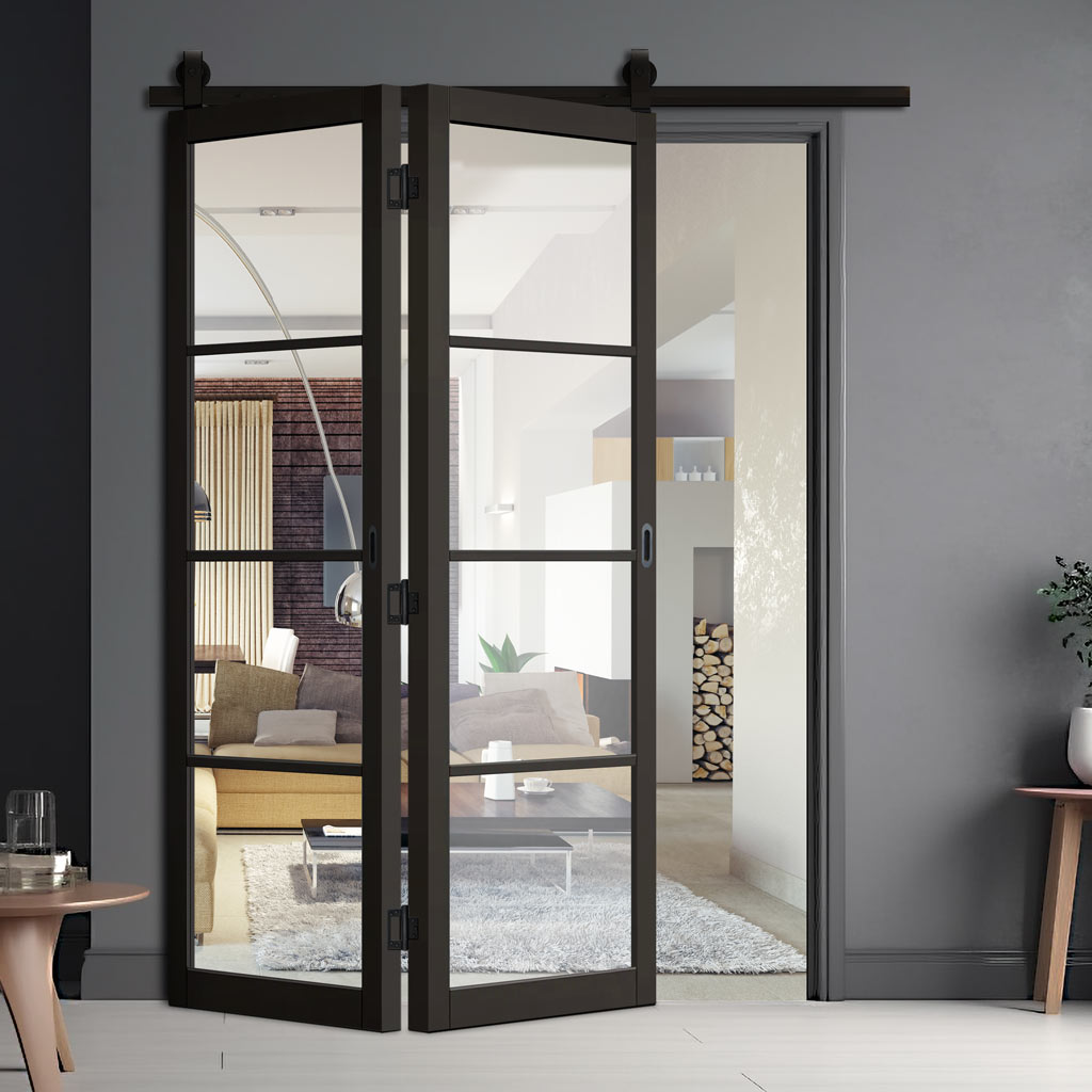 a modern interior with black-framed glass bi-folding doors