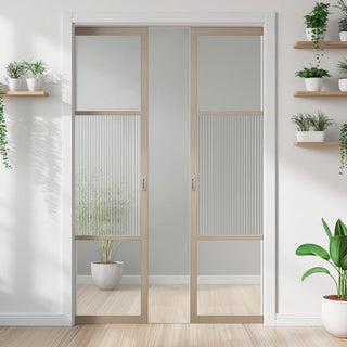 Image: Sutton Blonde Oak Absolute Evokit Double Pocket Doors - With Clear & Reeded Glass - Prefinished