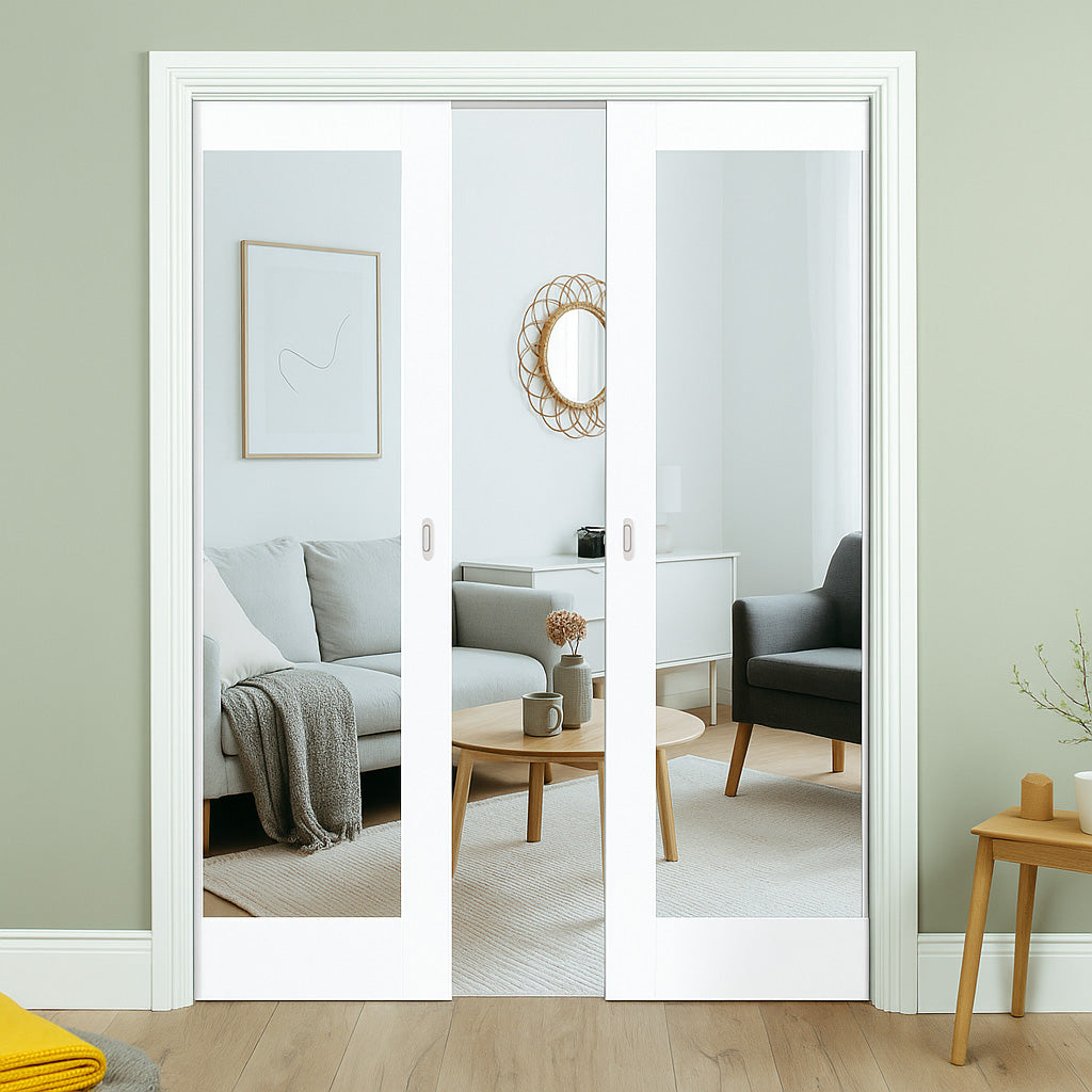 Modern interior sliding door with a view into a living room.