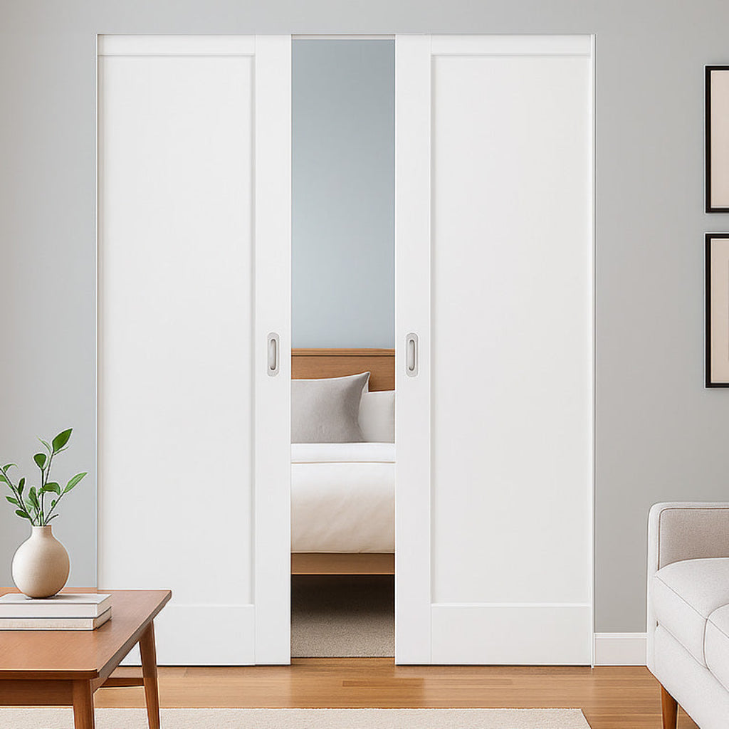 Modern interior with white sliding doors, wooden floor, and minimal decor.