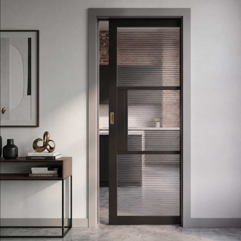 Tribeca 3 Pane Black Prefinished Single Evokit Pocket Door - Clear Reeded Glass