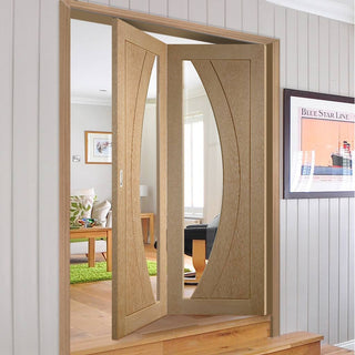 Image: Bespoke Thrufold Salerno Oak Glazed Folding 2+0 Door - Prefinished