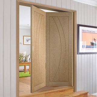 Image: Bespoke Thrufold Salerno Oak Flush Folding 2+0 Door - Prefinished