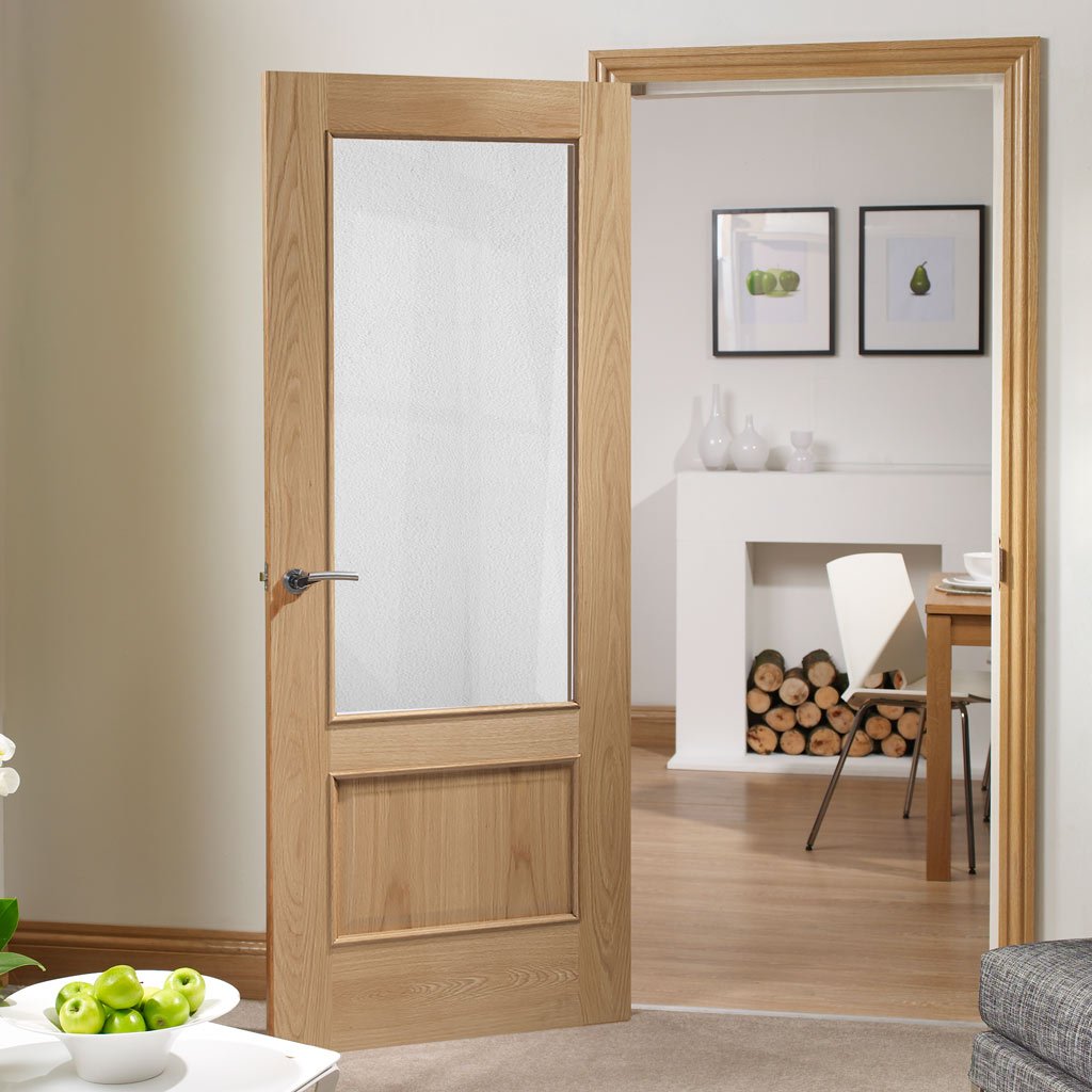 Oak interior door with elegant bevelled glass