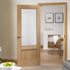 Oak interior door with elegant bevelled glass