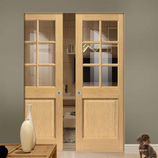 Image: Oak Arden Absolute Evokit Double Pocket Doors - Clear Glass