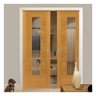 Image: Ostria Oak Double Evokit Pocket Doors - Clear Glass - Prefinished