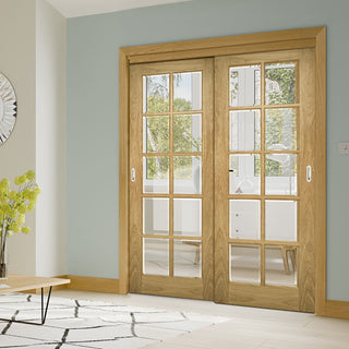 Image: Pass-Easi Two Sliding Doors and Frame Kit - Bristol Oak Unfinished Door - 10 Pane Clear Bevelled Glass