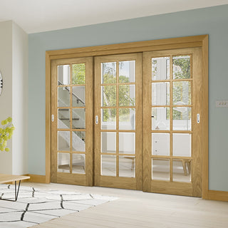 Image: Pass-Easi Three Sliding Doors and Frame Kit - Bristol Oak Unfinished Door - 10 Pane Clear Bevelled Glass