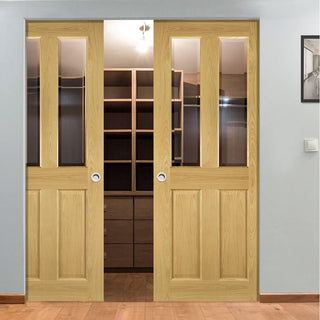 Image: Bury Oak Absolute Evokit Double Pocket Doors - Clear Bevelled Glass - Prefinished