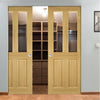 Bury Oak Absolute Evokit Double Pocket Doors - Clear Bevelled Glass - Prefinished