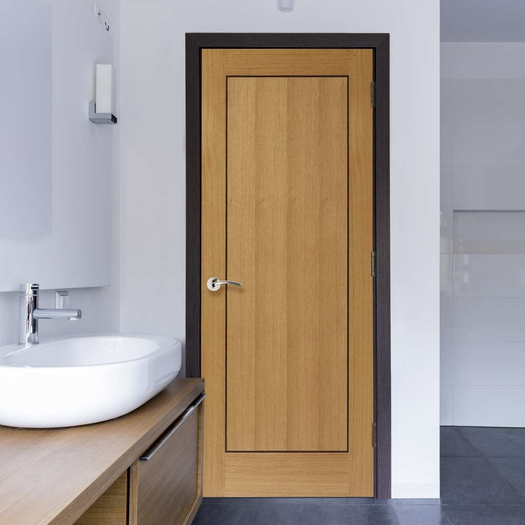 Image of bathroom door in oak with walnut inlays