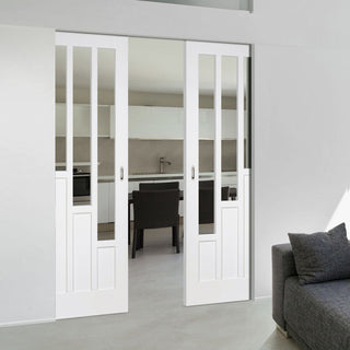 Image: Coventry Style White Primed Absolute Evokit Double Pocket Doors - Clear Glass - White Primed