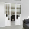 Coventry Style White Primed Absolute Evokit Double Pocket Doors - Clear Glass - White Primed
