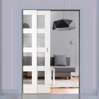 Image: Coventry Shaker Staffetta Twin Telescopic Pocket Doors - Clear Glass - White Primed