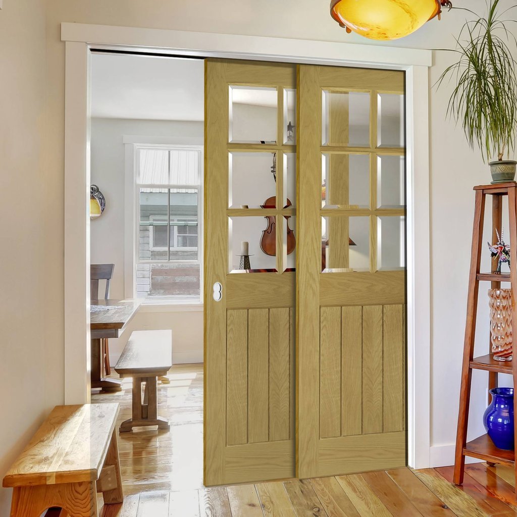 Ely Oak Veneer Staffetta Twin Telescopic Pocket Doors - Clear Bevelled Glass - Unfinished