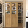 Ely American White Oak Veneer Staffetta Twin Telescopic Pocket Doors - Clear Bevelled Glass - Prefinished