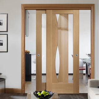 Image: Bespoke Thruslide Emilia Oak Glazed - 2 Sliding Doors and Frame Kit - Stepped Panel Design