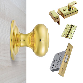 Image: External M51 Centre Knob Front Door Handle Pack - Brass Finish