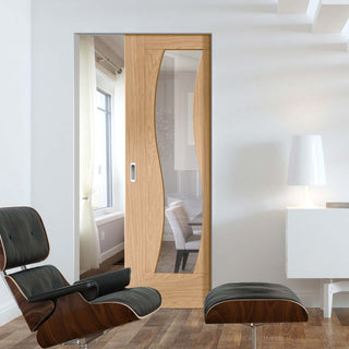 Image: Florence Oak Absolute Evokit Pocket Door - Clear Glass and Stepped Panel Design, Prefinished
