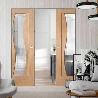Image: Florence Oak Absolute Evokit Double Pocket Door - Clear Glass and Stepped Panel Design - Prefinished