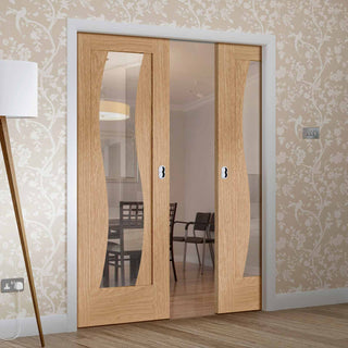 Image: Florence Oak Double Evokit Pocket Doors - Clear Glass and Stepped Panel Design - Prefinished