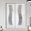 Florence White Staffetta Twin Telescopic Pocket Doors - Clear Glass and Stepped Panel Design - Prefinished