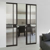 Greenwich Black Primed Absolute Evokit Double Pocket Doors - Clear Glass