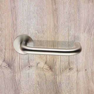 Image: Ambulant Return to Door Grade 4 Safety Lever Handles on Round Rose - Anti Bacterial