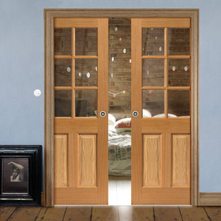 Image: Oak Dean Double Evokit Pocket Doors - Clear Glass