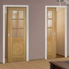 Kensington Oak Panel Unico Evo Pocket Doors - Clear Bevelled Glass - Prefinished