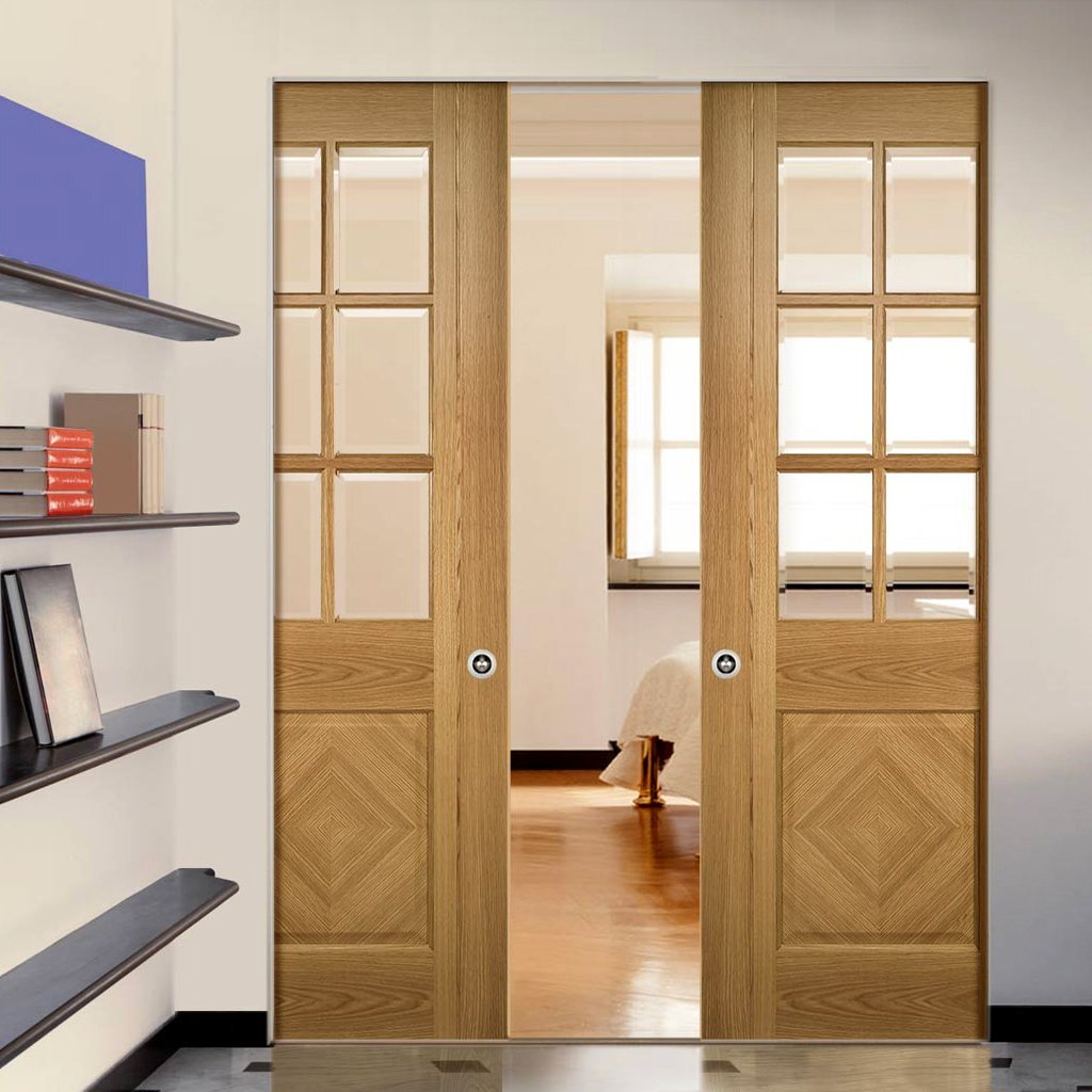 Kensington Oak Panel Absolute Evokit Double Pocket Doors - Clear Bevelled Glass - Prefinished