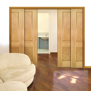 Image: Kensington Oak Panel Staffetta Quad Telescopic Pocket Doors - Prefinished