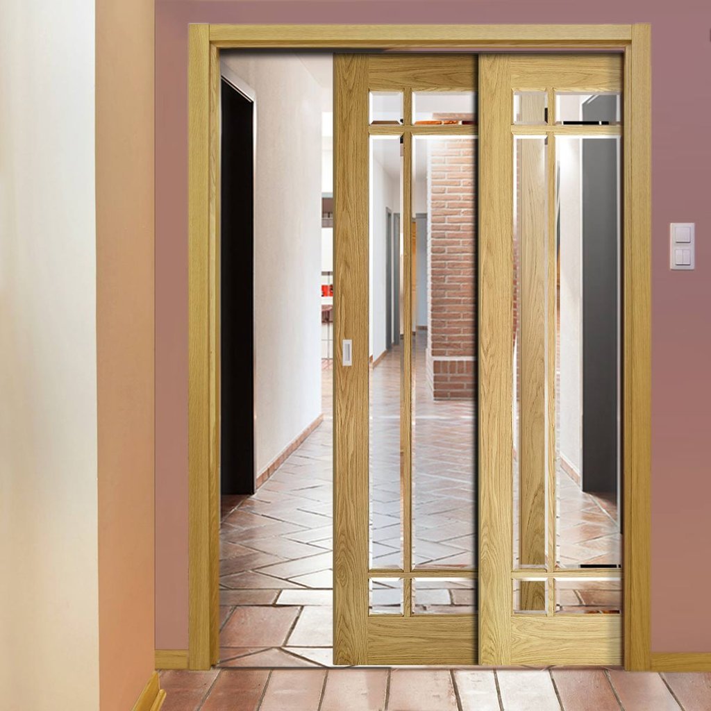 Kerry Oak Veneer Staffetta Twin Telescopic Pocket Doors - Bevelled Clear Glass - Unfinished