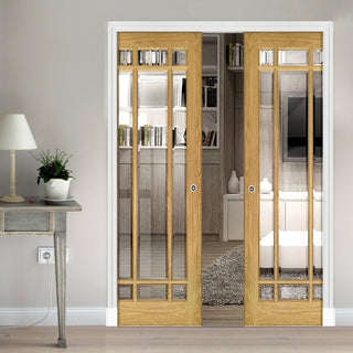 Image: Kerry Oak Double Evokit Pocket Doors - Bevelled Clear Glass - Unfinished
