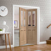 Two Folding Doors & Frame Kit - Malton Oak 2+0 - No Raised Mouldings - Bevelled Clear Glass - Prefinished