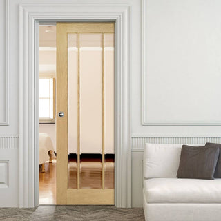 Image: Norwich Real American Oak Veneer Single Evokit Pocket Door - Clear Bevelled Glass - Unfinished